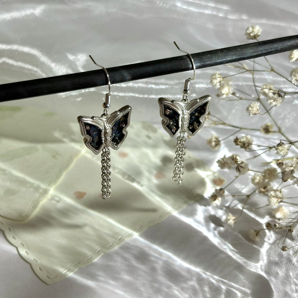 Butterfly tassel drop earrings