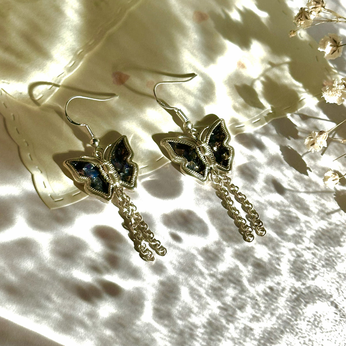 Butterfly tassel drop earrings